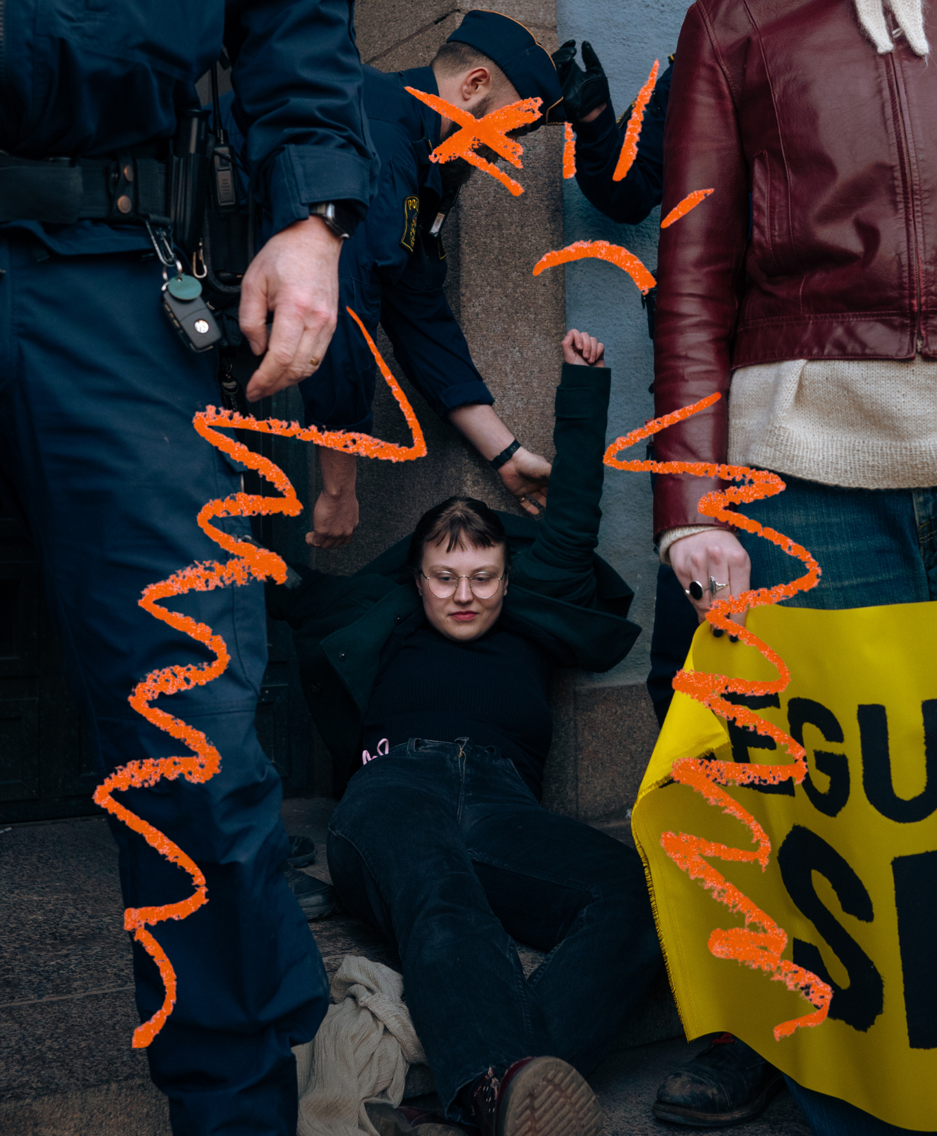 bild på en person som blir tagen av polisen